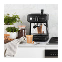 Sunbeam EM4300K Mini Barista Black Espresso Machine, Front view with cup full of coffee