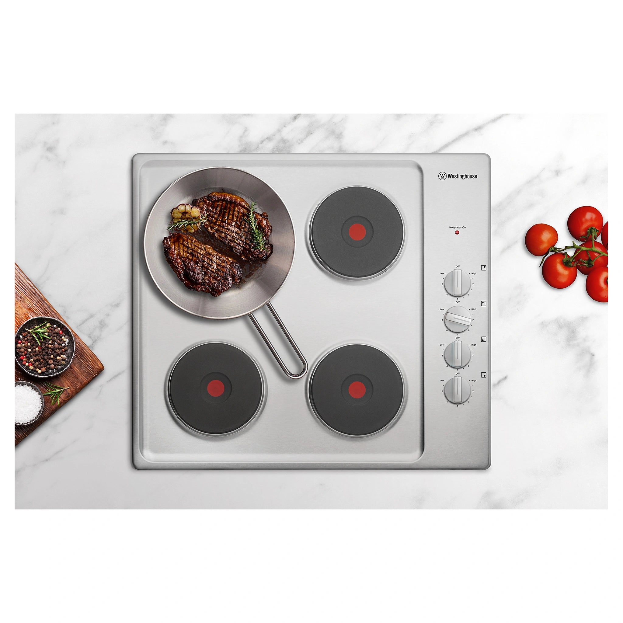 Westinghouse 60cm Electric Solid Cooktop, Stainless Steel WHS642SC, Cooking View