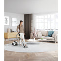 Electrolux ZUF4303PET Ultraflex Vacuum Cleaner, A women cleaning the carpet
